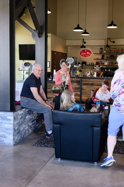 a group gathered in a cafe