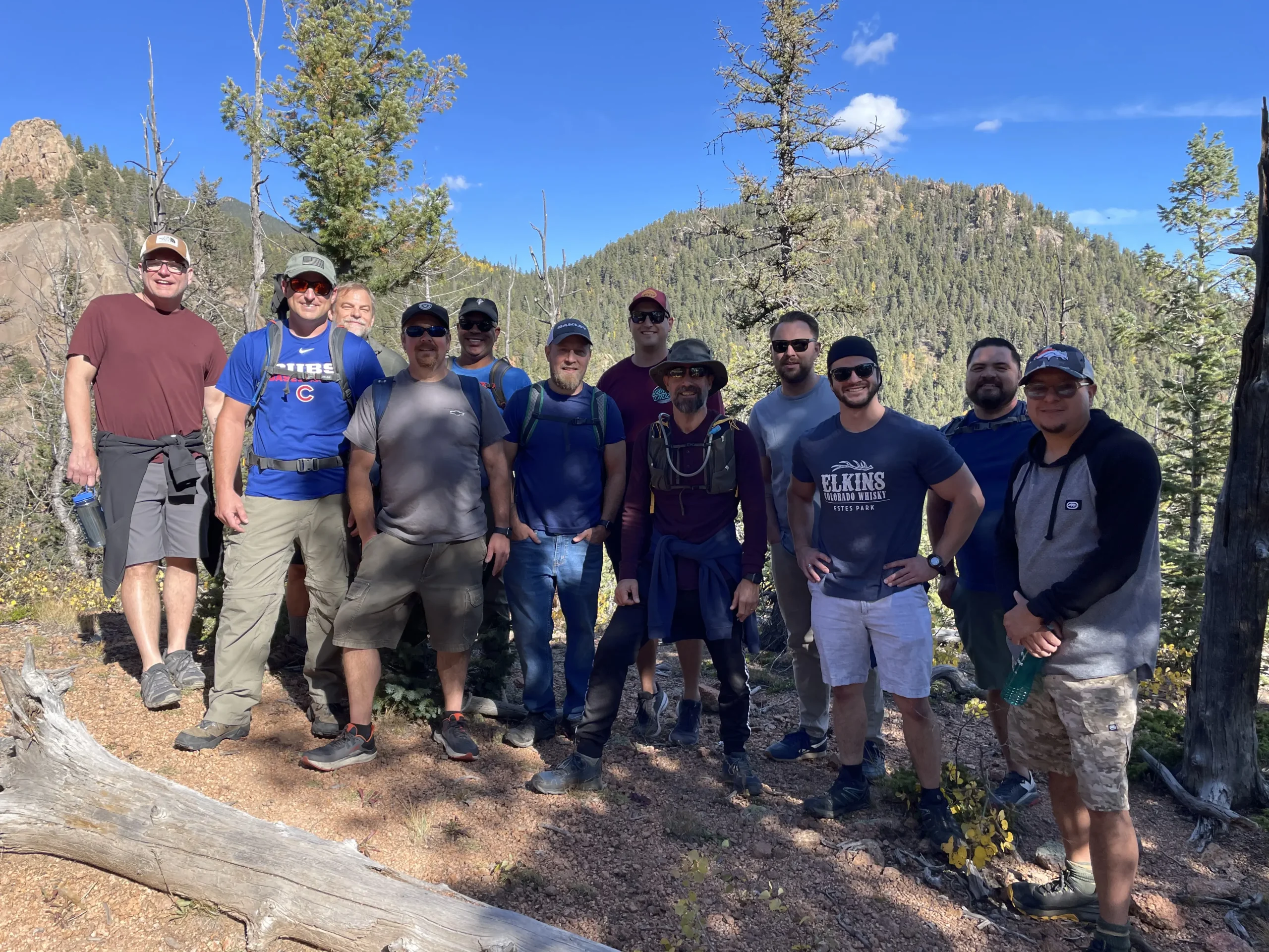 a group of men on the side of a mountain